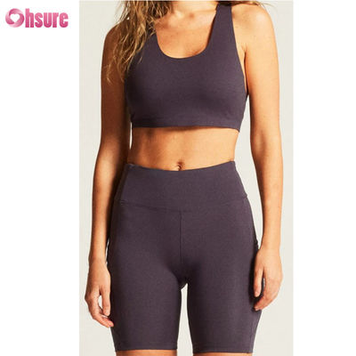 Abbigliamento sportivo personalizzato di nuova concezione di alta qualità, abbigliamento yoga, pantaloncini sportivi da esterno, logo personalizzato, fitness, reggiseno yoga sexy con incrocio sulla schiena