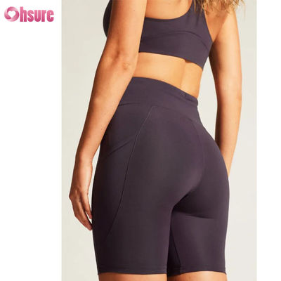 Abbigliamento sportivo personalizzato di nuova concezione di alta qualità, abbigliamento yoga, pantaloncini sportivi da esterno, logo personalizzato, fitness, reggiseno yoga sexy con incrocio sulla schiena