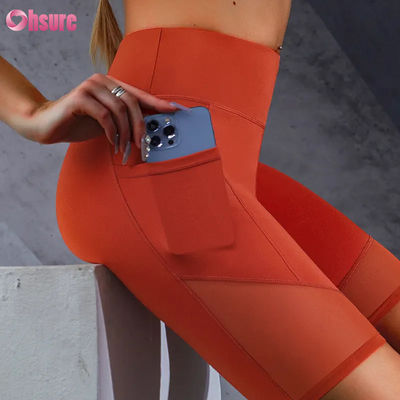 Stampa logo personalizzata, leggings corti caldi in vendita, tasche, cuciture in rete, vita alta, sollevamento glutei, dimagranti, pantaloncini da yoga, leggings all'ingrosso
