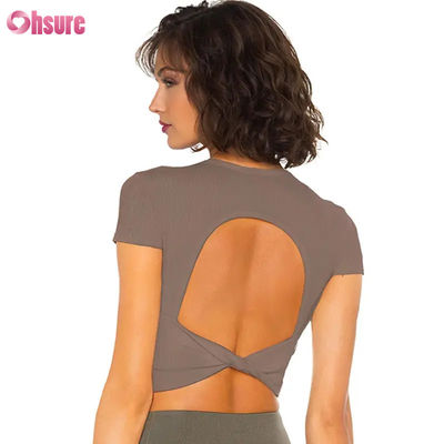 Maglietta sportiva da donna traspirante, ad asciugatura rapida, effetto nudo, altamente elastica, con schiena scoperta, per fitness, allenamento e corsa