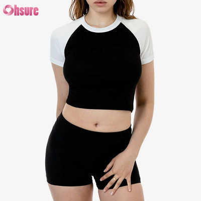 Top sportivo in cotone al 100% per donna con manica a maglia, traspirante, con logo personalizzato.