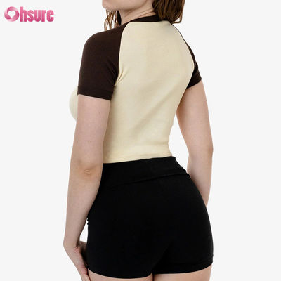 Top sportivo in cotone al 100% per donna con manica a maglia, traspirante, con logo personalizzato.