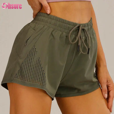 Giubbotti da allenamento sportivo per donne al dettaglio Breathable Laser Cut Jogging Shorts with Warm-up Zipper Side Pocket Solid Pattern