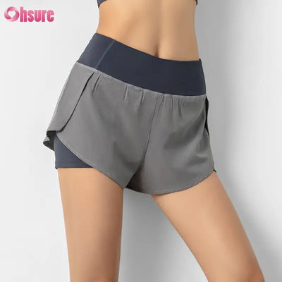 Vendita calda Calze da corsa da donna a vita alta Calze da corsa secche veloci a doppio strato Calze da allenamento sportivo Tasche respirabili Fitness Yoga Wear
