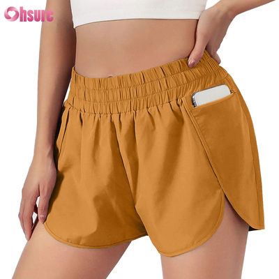 Calzoncini sportivi a secco veloce da vita alta da donna con elasticità Calzoncini da corsa e da esercizio alla moda con tasche