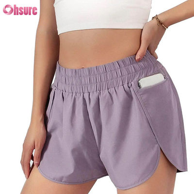 Calzoncini sportivi a secco veloce da vita alta da donna con elasticità Calzoncini da corsa e da esercizio alla moda con tasche