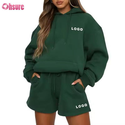 Completo sportivo oversize da donna all'ingrosso, composto da pantaloncini e felpa con cappuccio, 2 pezzi, con logo personalizzato