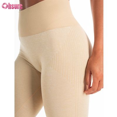 Oem Fabbrica vendita diretta Pantaloni sportivi colore solido Pantaloni da ginnastica personalizzabili Fitness Wear Leggings di design senza cuciture per donne
