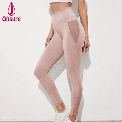 Pantaloni da corsa in mesh traspirante con tasca Leggings da yoga personalizzati per donna Collant da palestra a compressione